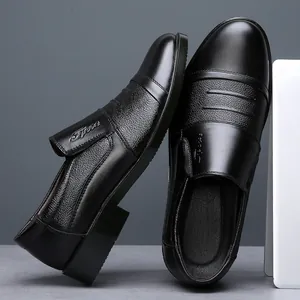 Side view detail of black men's leather business shoes with elegant triple-stitch design