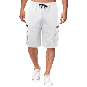 Close-up of white cargo shorts featuring drawstring waist and side flap pockets