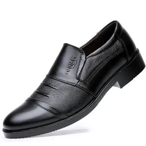 Close-up of men's black leather business shoes with embossed Sport logo and textured finish.