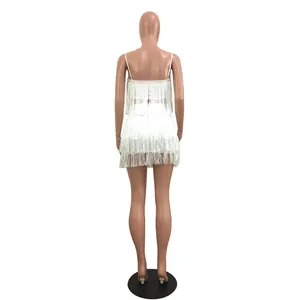 Detailed back view of a stylish white fringe two-piece nightclub set with tassels