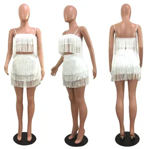 Multi-angle views of white fringe two-piece clubwear set on a display mannequin.