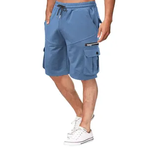 Close-up view of blue men's cargo shorts featuring multi-pockets and drawstring