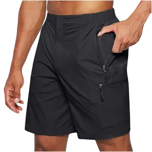 Close-up of black men's cargo shorts with multiple secure zipper pockets for phone
