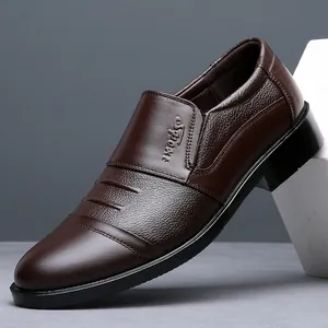 Side profile of brown leather dress shoe showcasing textures and Sport embossed detail