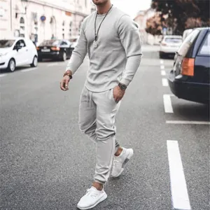 Men's casual light gray tracksuit set with crew neck long sleeve top and matching joggers