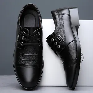 Detailed side and front view of black leather cap-toe business formal shoes