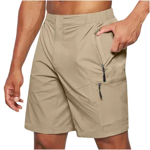 Close-up of men's khaki cargo shorts with multiple functional zipper pockets