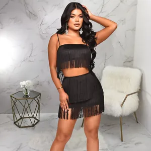 Sexy black fringe two-piece set featuring a cami crop top and matching mini skirt.