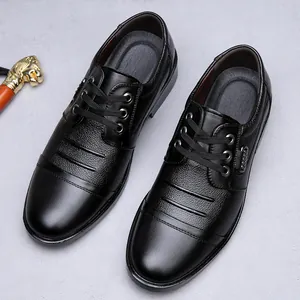 Close-up of black men's genuine leather business dress shoes with lace-up design