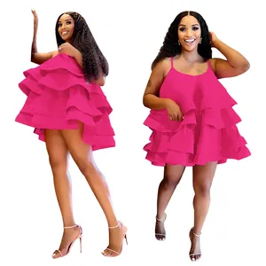 Front and side view of fuchsia pink tiered ruffle babydoll mini dress with straps