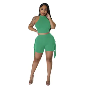 Sleeveless green crop top and fringe shorts two-piece set for women