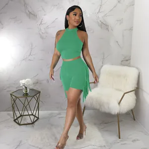 Detailed view of women's sleeveless round neck two-piece set with fringe in green