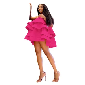Detailed view of hot pink tiered satin puff dress with U-neck suspenders for women