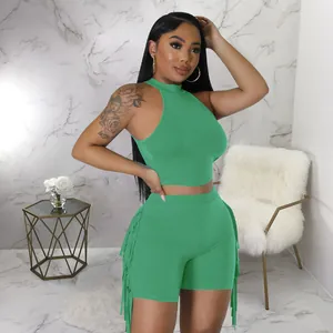 Green sleeveless two-piece set with stylish fringe detailing for women's summer wear