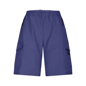 Detailed view of men's blue cargo shorts with multi-pockets and elastic waist