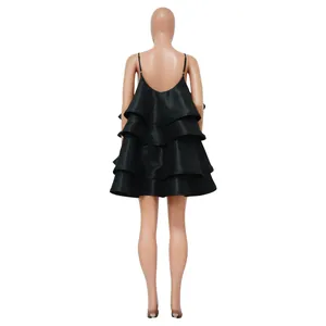 Back view of a tiered black satin mini dress with delicate spaghetti straps