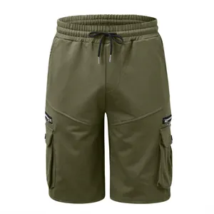 Detailed view of olive green men's cargo shorts with functional multi-pocket design