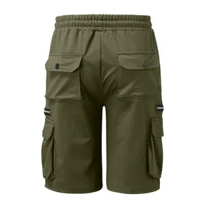 Back view of olive green men's cotton cargo shorts featuring a functional multi-pocket design