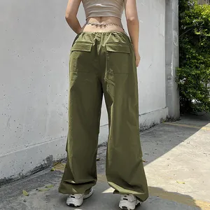 Detailed rear view of women's loose olive green cargo pants with utility pockets
