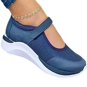 Women's blue mesh Mary Jane sneakers with thick white sole and Velcro strap