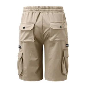 Back view of men's khaki cargo shorts with multiple flap pockets and elastic waist
