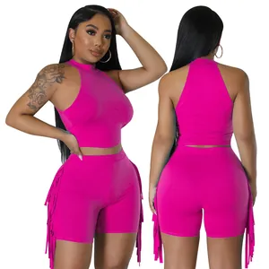 Detailed view showing the front and back of a pink sleeveless top and fringe shorts set