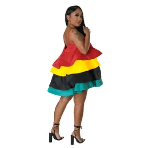 Side view of a vibrant four-tier satin puffy dress with adjustable camisole straps