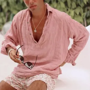 Detail view of the pink linen fabric and casual V-neck design on this men's summer shirt.