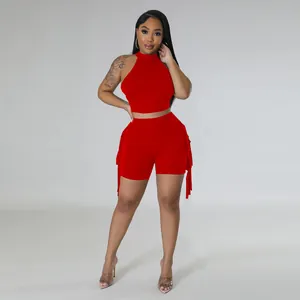 Elegant red sleeveless crop top paired with matching fringe shorts two-piece set for women
