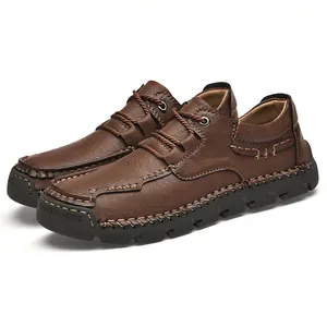 Professional handmade brown low-top outdoor hiking boots for men with non-slip rubber soles