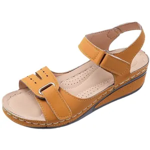 Comfortable women's mustard yellow wedge sandals with platform and Velcro straps