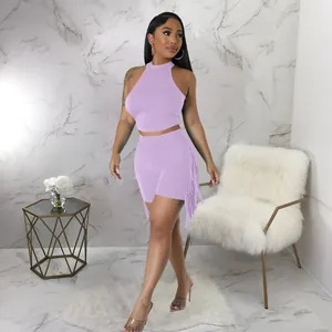 Lavender two-piece set with sleeveless halter top and side fringe biker shorts detail