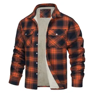 Close-up detail of warm fleece sherpa lining in orange and black plaid flannel shirt jacket