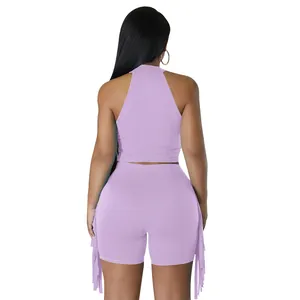 Back view of lavender sleeveless crop top and shorts set with side fringe details