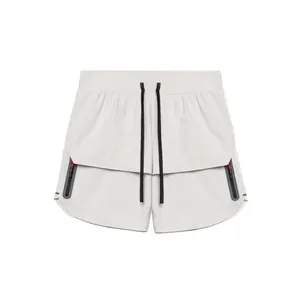 Men's athletic shorts with black drawstrings and zippered pockets in light gray finish