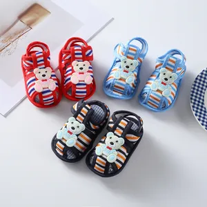 Three pairs of colorful striped baby sandals with cute bear patches and soft soles.