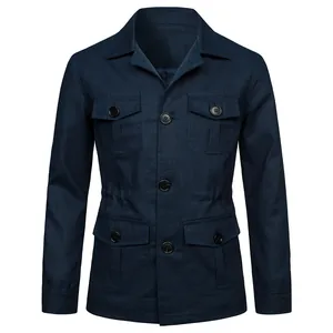 Macro view showing the front pockets and buttons of a men's navy blue linen jacket