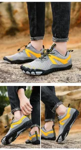 Detail views of breathable outdoor hiking shoes on rocky terrain in grey and yellow.