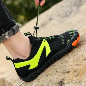 Lightweight breathable outdoor hiking shoes with non-slip soles on rocky terrain
