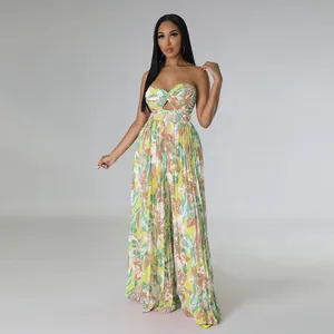 Combinaison bustier élégante avec imprimé floral tropical et jambes larges pour l'été.