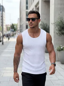 Close-up of white ribbed tank top featuring slim fit and breathable knitted fabric