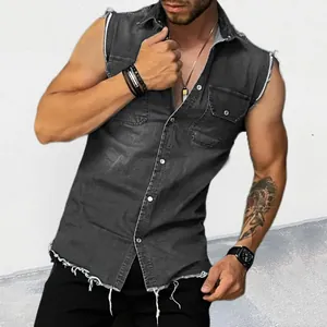 Close-up of men's distressed grey denim muscle vest showing the raw hem and pocket details