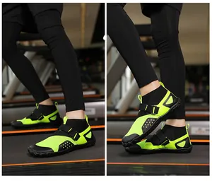 Close-up of neon green high-top aqua shoes with breathable mesh and anti-slip rubber sole