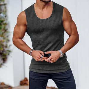 Close-up of men's slim fit ribbed knit tank top showing fabric texture and fit