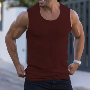 Close-up of burgundy ribbed men's fitness tank top showing slim fit and fabric texture