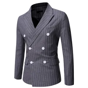 Close-up of a men's grey pinstripe double-breasted blazer featuring white buttons and peak lapels