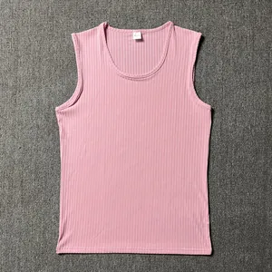 Detailed flat lay view of a high-quality pink ribbed slim fit men's athletic tank top