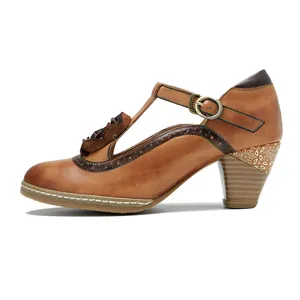 Side view detail of vintage handmade tan leather Mary Jane high heel shoe with T-strap
