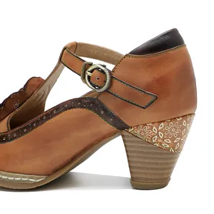 Close-up of vintage leather Mary Jane high heel with hand-rubbed finish and wood grain heel