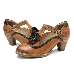 Vintage hand-rubbed brown leather Mary Jane high heels with elegant rose decoration